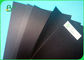100% लकड़ी लुगदी ग्रे कार्डबोर्ड चादरें अच्छा प्रतिरोध प्रतिरोध 1.5-2.0 मिमी बैग के लिए ब्लैक बुक बाइंडिंग बोर्ड